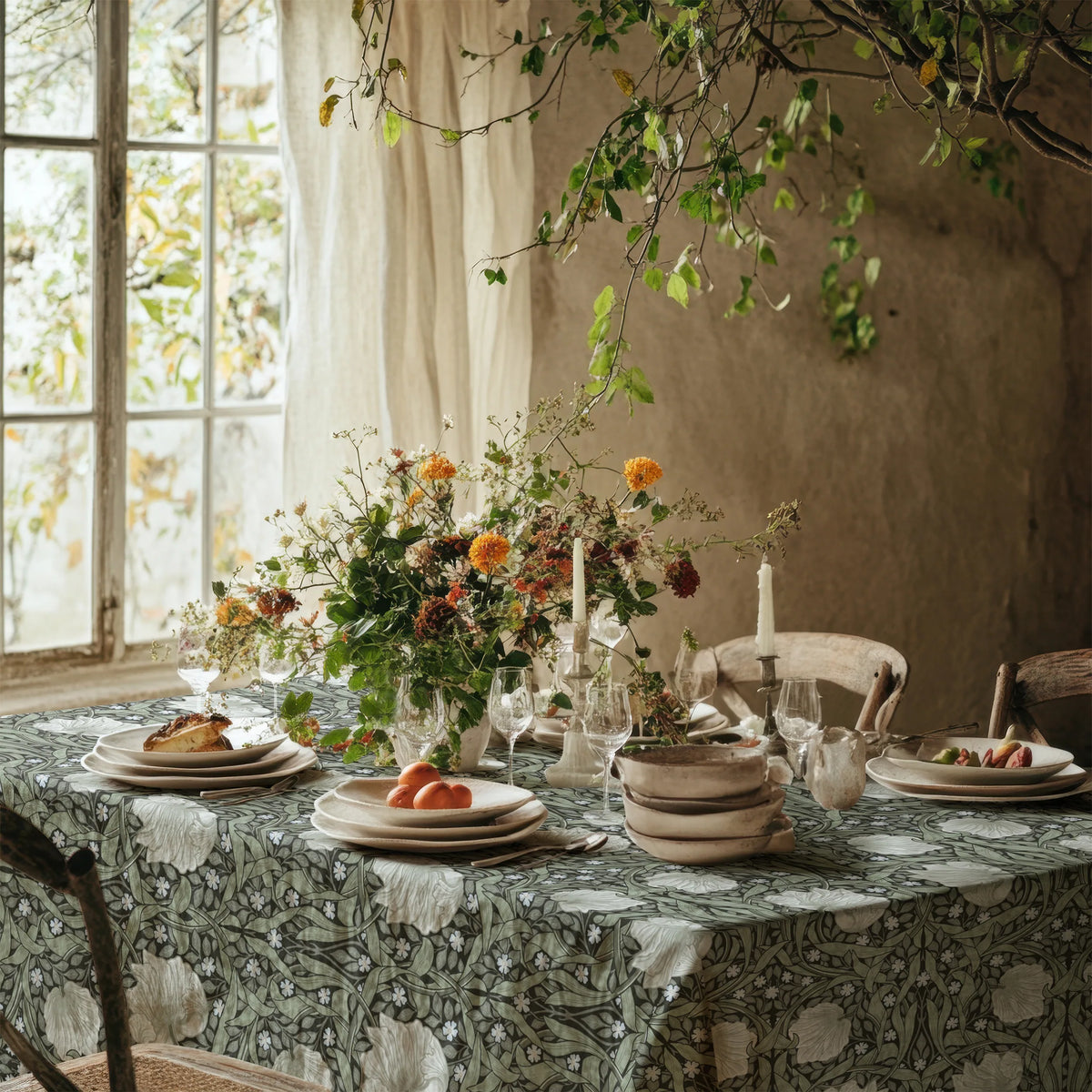 William Morris Pimpernel tablecloth in Dreamy Sage on a dining table