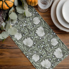 William Morris Pimpernel table runner in Dreamy Sage with a place setting and greenery
