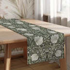William Morris Pimpernel table runner in Dreamy Sage layered over a linen tablecloth