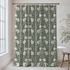 William Morris Pimpernel extra long shower curtain in Dreamy Sage 1121: ivory tulips and soft sage leaves on a dark charcoal-green ground. Floor-length cotton sateen hung from a high-mounted rod in a bright bathroom, handmade to order in 84, 96 and 108 inch lengths.