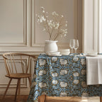 William Morris Pimpernel tablecloth in Blue and Gold in a styled dining room
