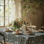 William Morris Pimpernel tablecloth in Blue and Sage on a dining table