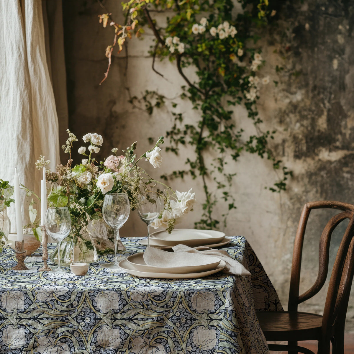 William Morris Pimpernel tablecloth in Blue and Sage with a place setting
