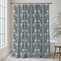 William Morris Pimpernel extra long shower curtain in Blue & Sage 2143: cream tulips and sage-green leaves on a deep navy ground. Floor-length cotton sateen hung from a high-mounted rod in a bright bathroom, handmade to order in 84, 96 and 108 inch lengths.