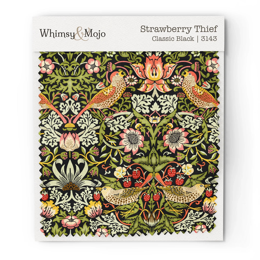 Fabric swatch of William Morris Strawberry Thief pattern in Classic Black colorway, showing the bird and berry motif up close for color and texture reference.