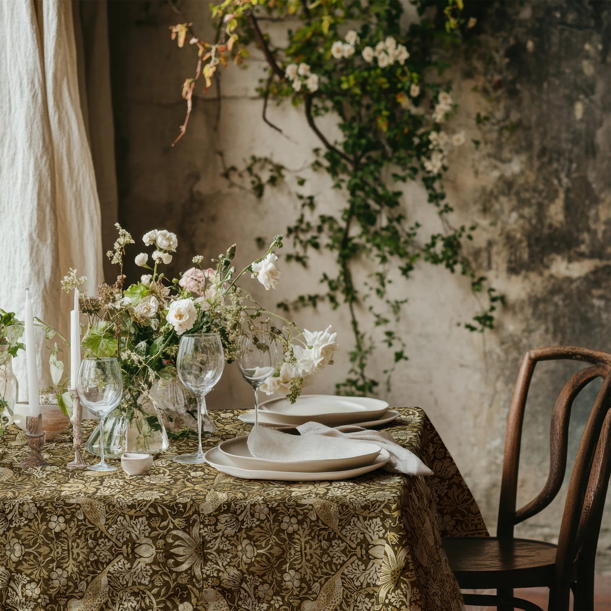 William Morris Strawberry Thief tablecloth in Golden Garden with a place setting