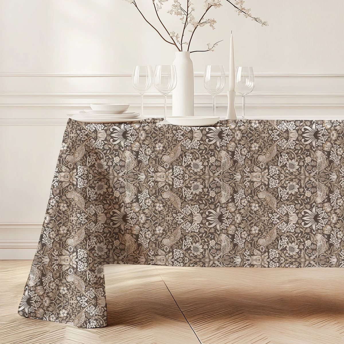 William Morris Strawberry Thief tablecloth in Country Greige (3147) draped over a dining table, showing the full drop and corner