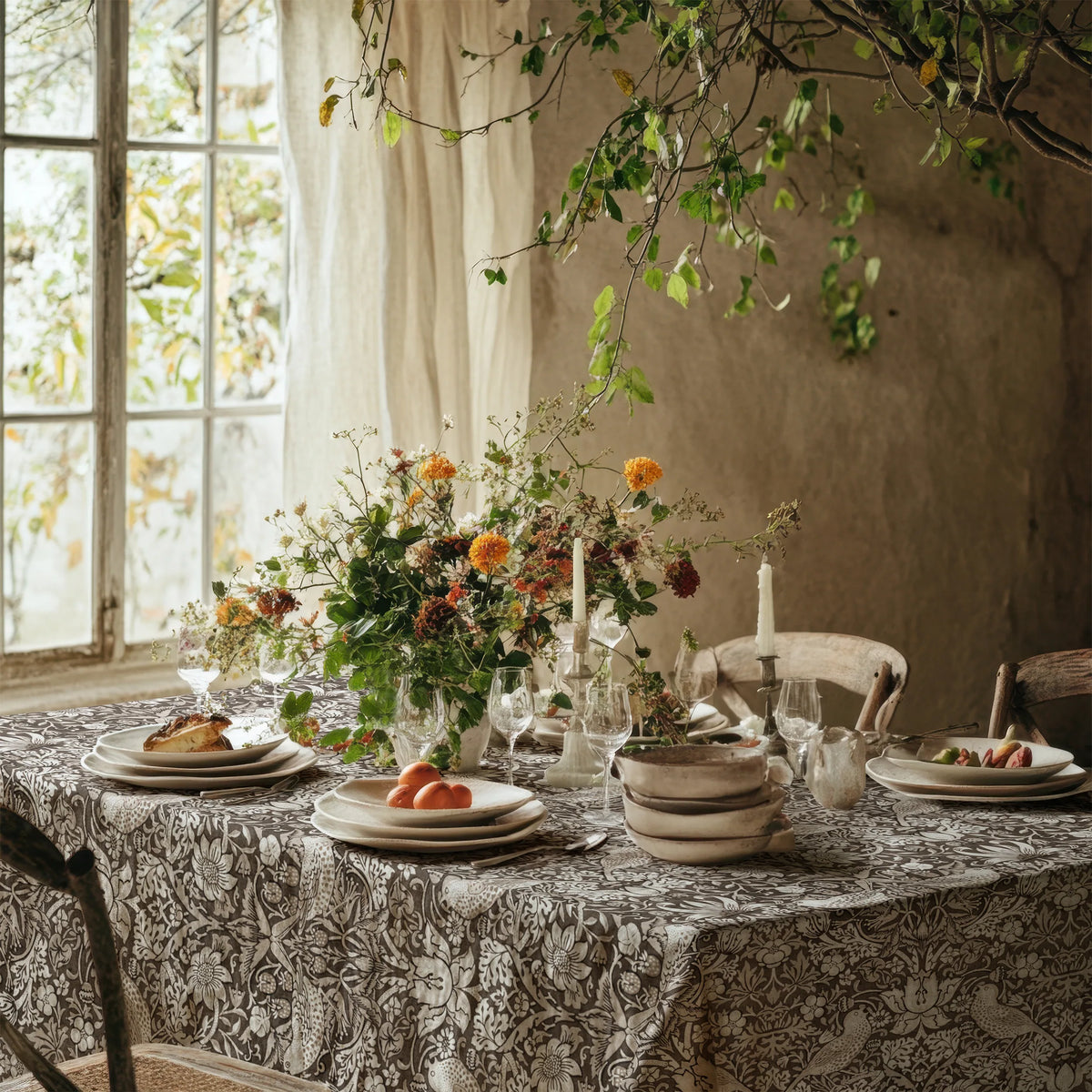 William Morris Strawberry Thief tablecloth in Country Greige on a dining table