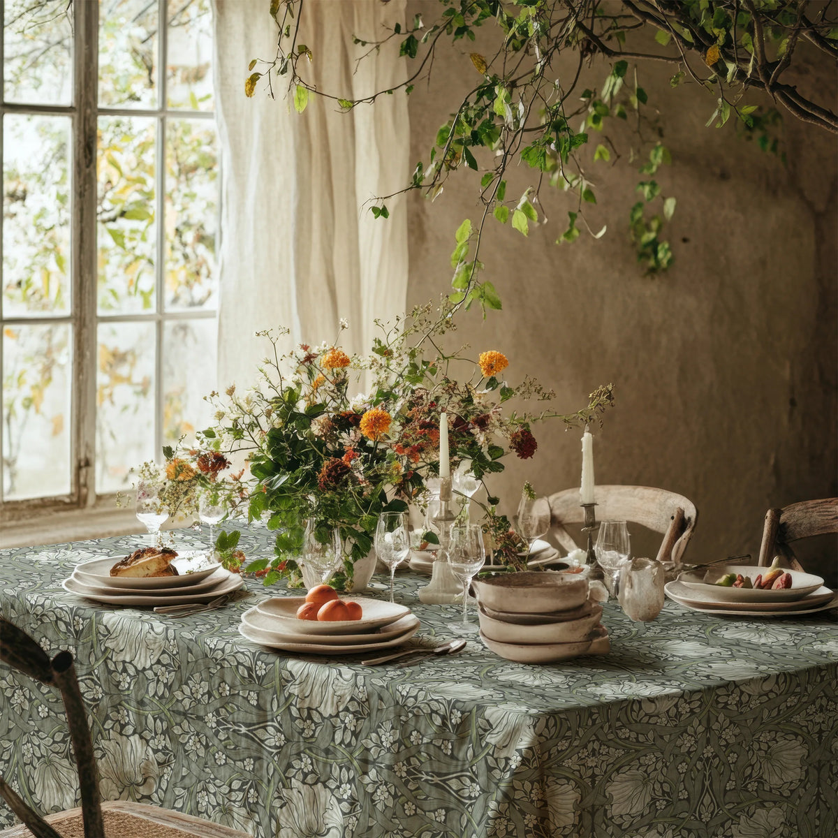 William Morris Pimpernel tablecloth in Silver Sage on a dining table