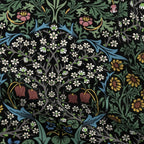 William Morris Blackthorn upholstery fabric in Classic Black, close view of the printed cloth