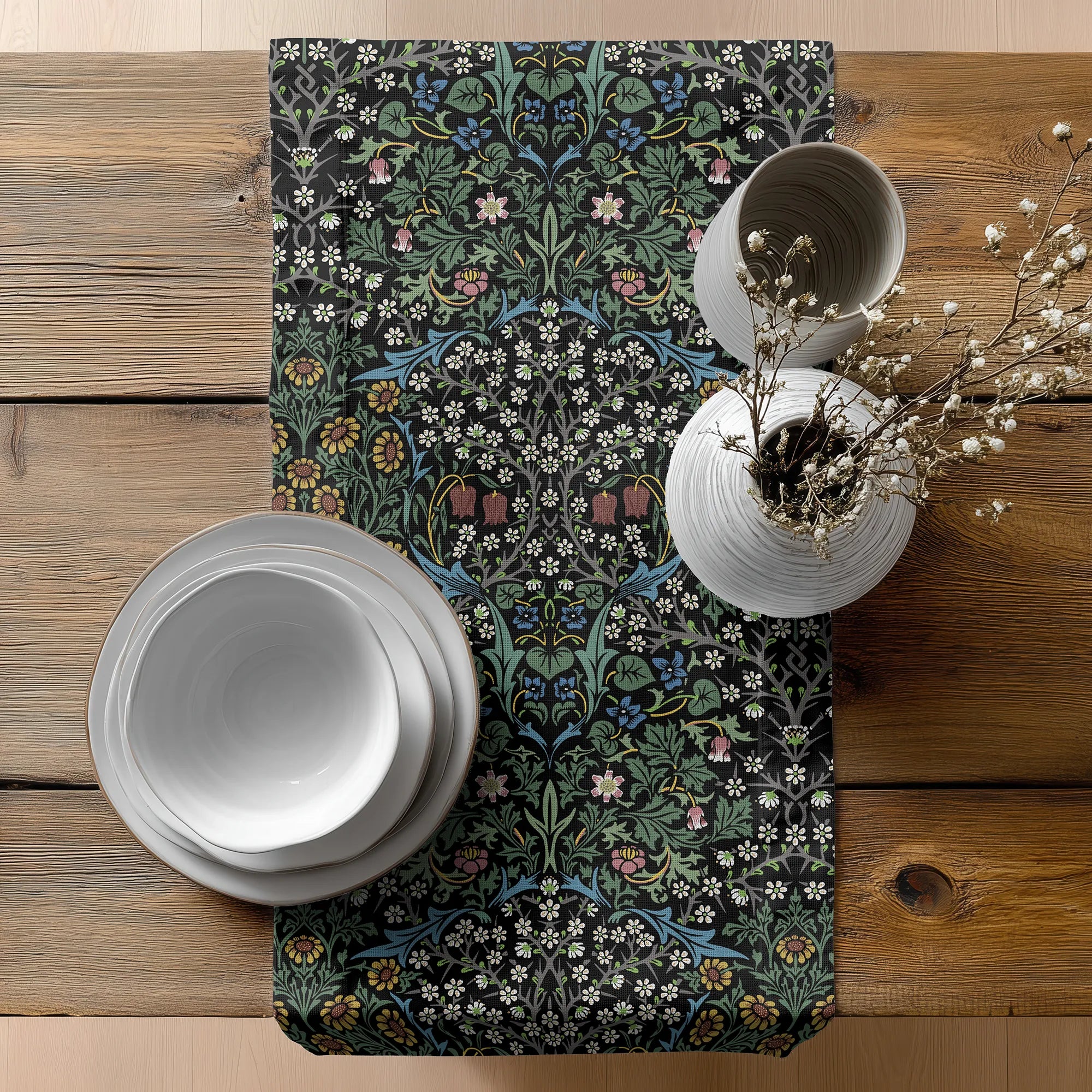 Easter table setting with a floral-patterned William Morris table runner in black on a wooden table