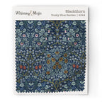 Fabric swatch of William Morris Blackthorn pattern in Dusky Blue Garden colorway, showing color and texture up close.
