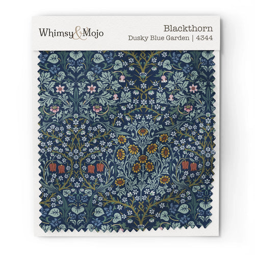 Fabric swatch of William Morris Blackthorn pattern in Dusky Blue Garden colorway, showing color and texture up close.