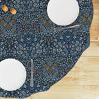 William Morris tablecloth round in Dusky  Blue Blackthorn floral design, with intricate vines and floral motifs, styled for cottagecore tablescapes and English country dining rooms.
