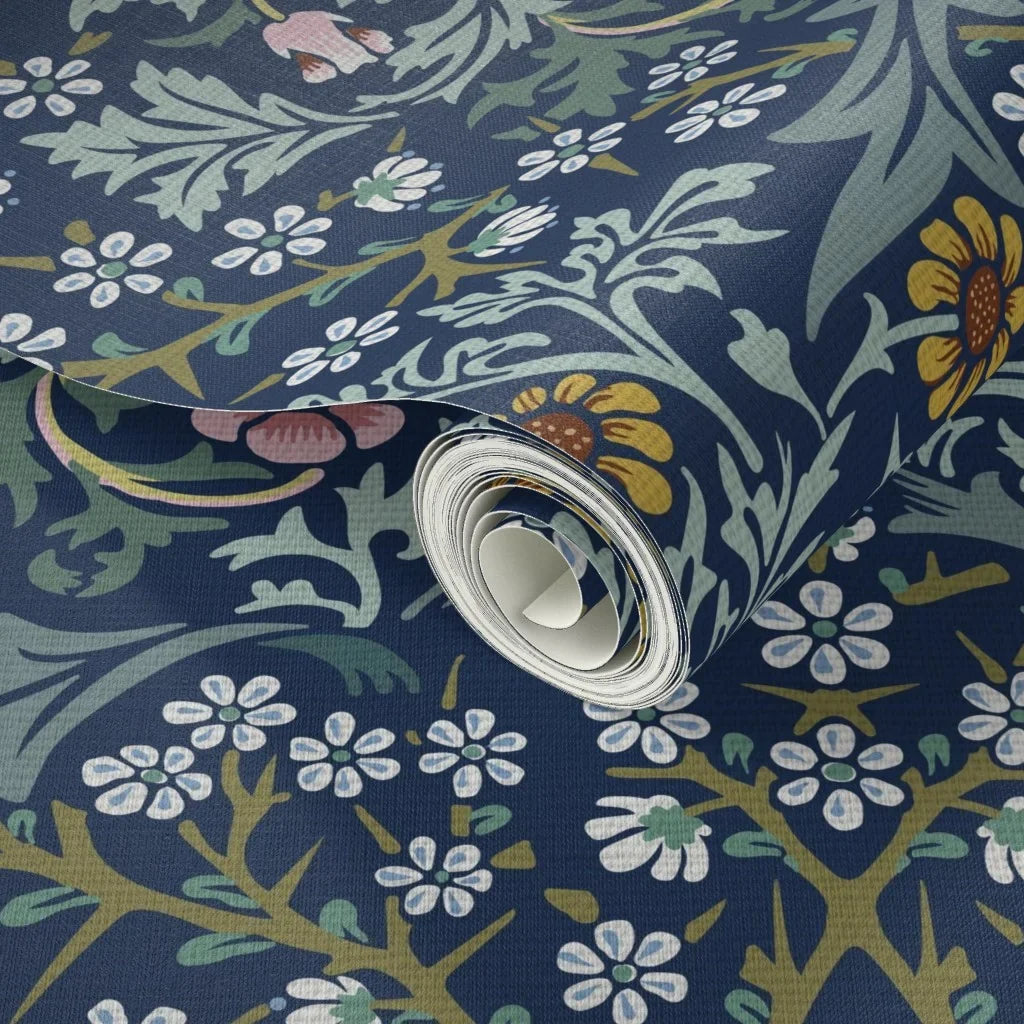 Wallpaper sample of William Morris Blackthorn in Dusky Blue Garden, showing the botanical pattern up close.
