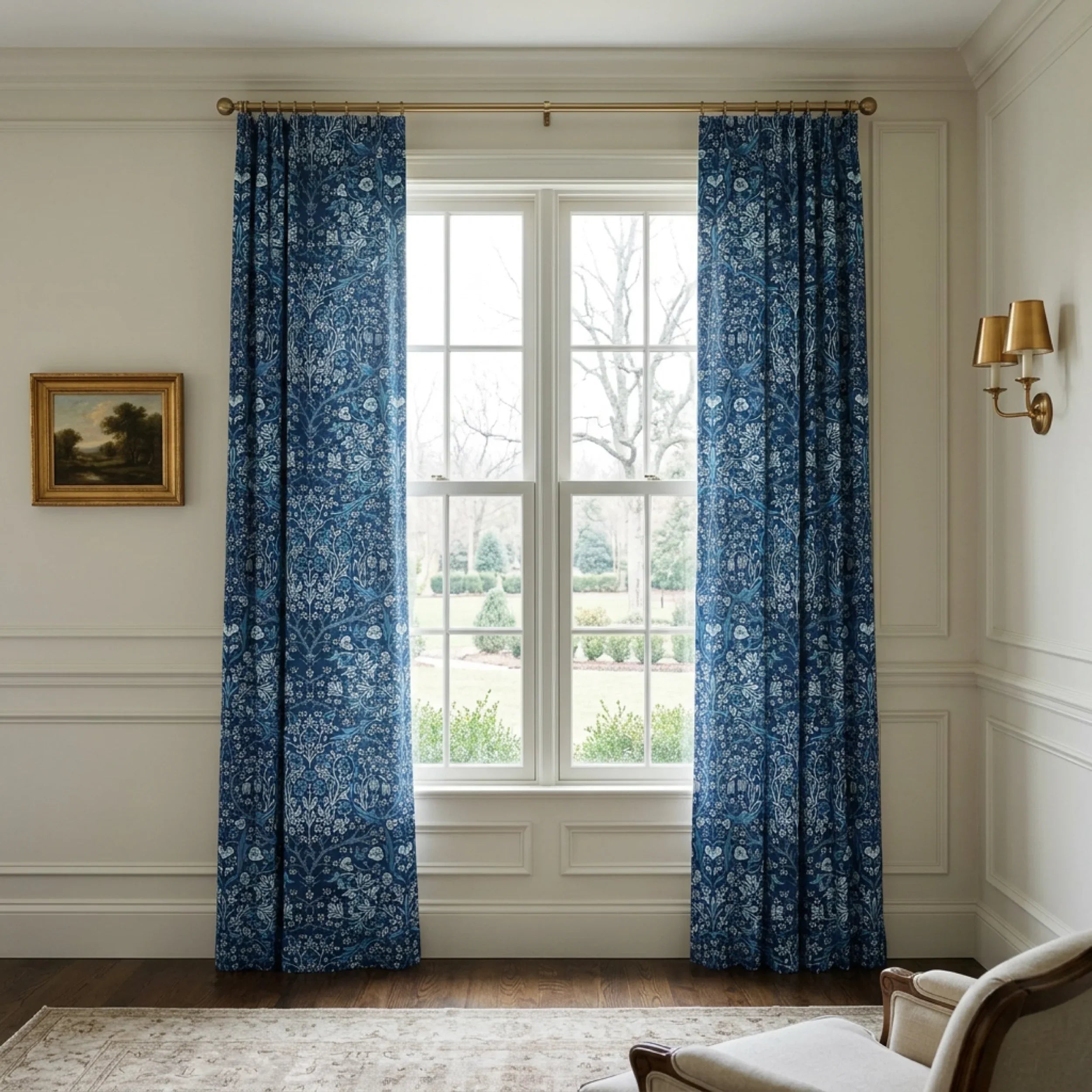 William Morris Blackthorn fabric in English Lapis made up as curtains at a tall sash window.
