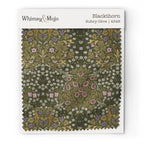 Fabric swatch of William Morris Blackthorn pattern in Sultry Olive colorway, showing color and texture up close.