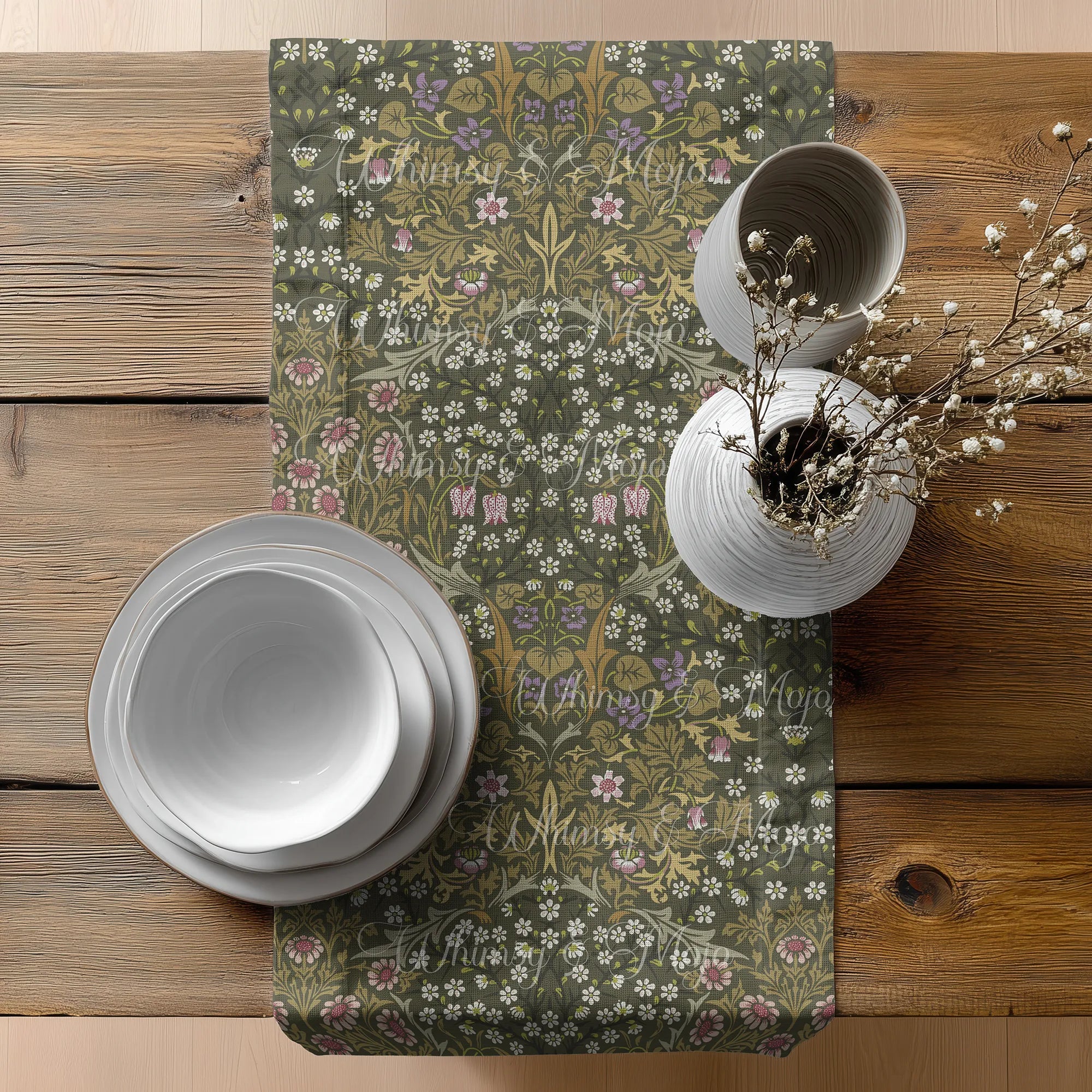 Decorative Easter table setting with a floral-patterned William Morris table runner in olive green on a wooden table.