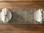 William Morris Blackthorn table runner with floral pattern on a wooden table. Secret Garden cottagecore table runners