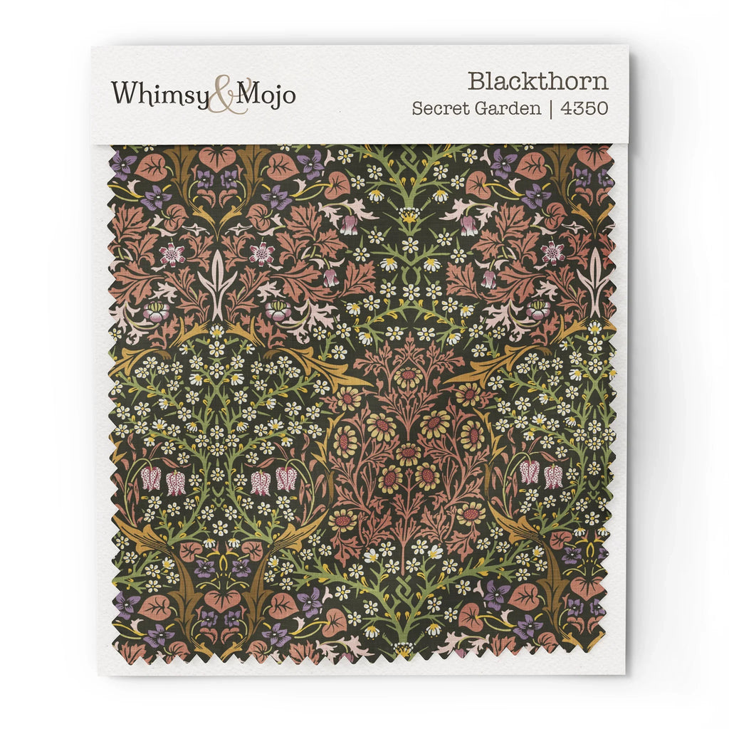 Fabric swatch of William Morris Blackthorn pattern in Secret Garden colorway, showing color and texture up close.