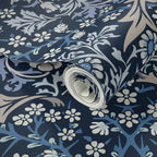 Close-up of William Morris Blackthorn wallpaper in Midnight Garden, showing the botanical pattern and color up close.