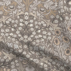 William Morris Blackthorn upholstery fabric in Heritage Taupe, close view of the printed cloth