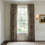 Blackthorn Heritage Taupe fabric sewn into pinch-pleat curtain panels in a panelled room