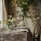 William Morris Pimpernel tablecloth in Rich Cocoa with a place setting