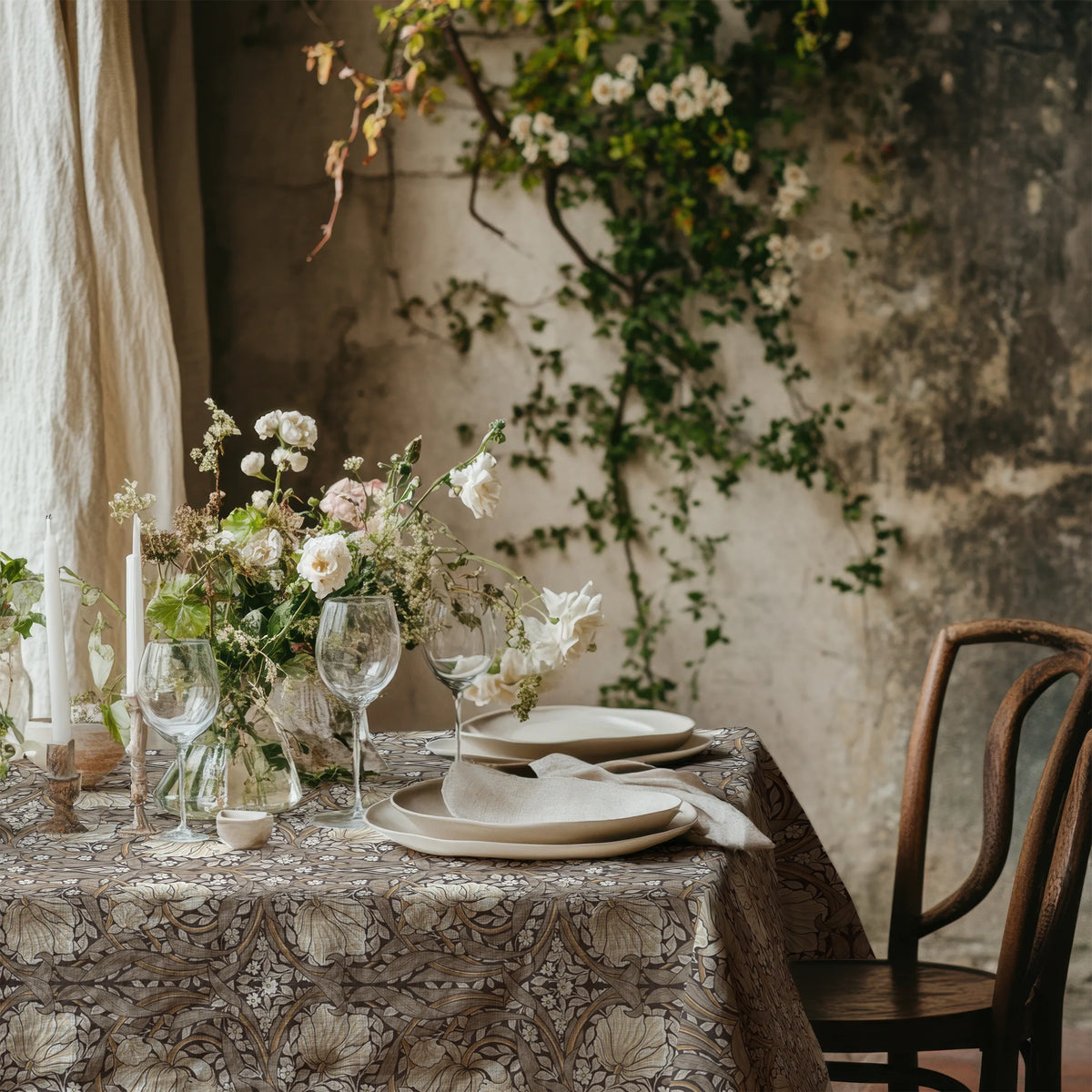 William Morris Pimpernel tablecloth in Rich Cocoa with a place setting