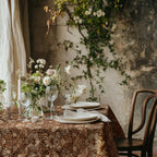William Morris Strawberry Thief tablecloth in Pumpkin Spice with a place setting