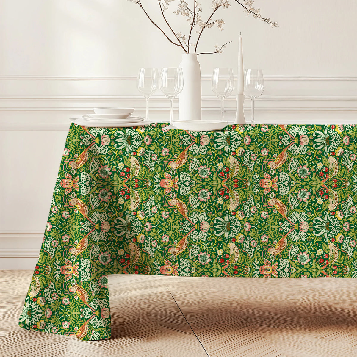 William Morris Strawberry Thief tablecloth in Forest Green (4382) draped over a dining table, showing the full drop and corner