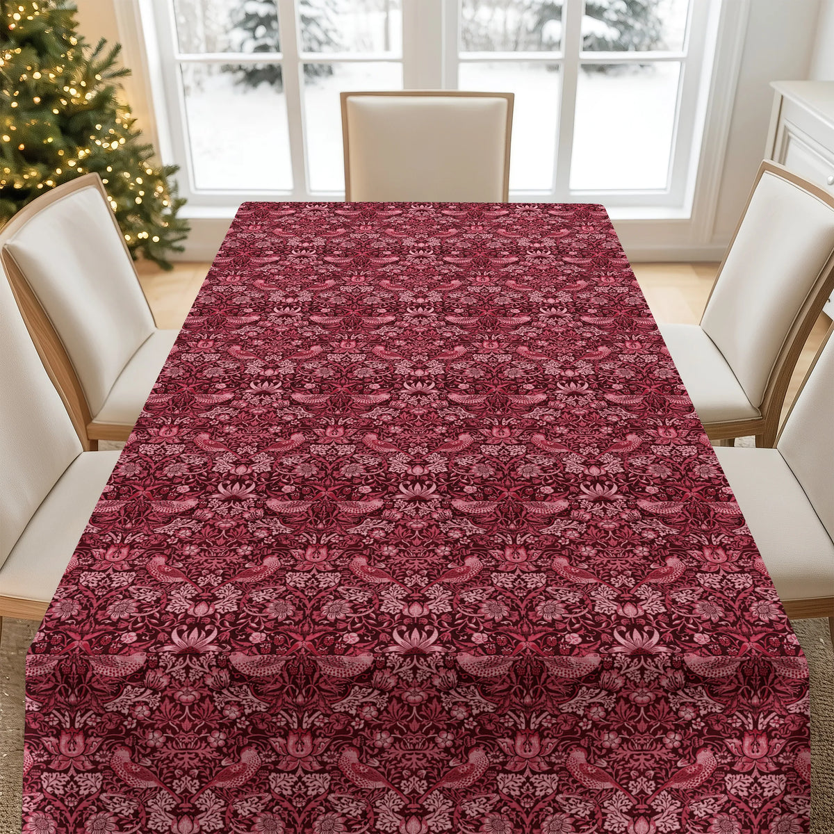 William Morris Strawberry Thief tablecloth in Crimson Berry on a set dining table
