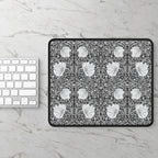 Floral patterned William Morris mouse pad on a marble surface with a keyboard.