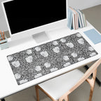 Large William Morris desk mat on a white desk with a computer setup