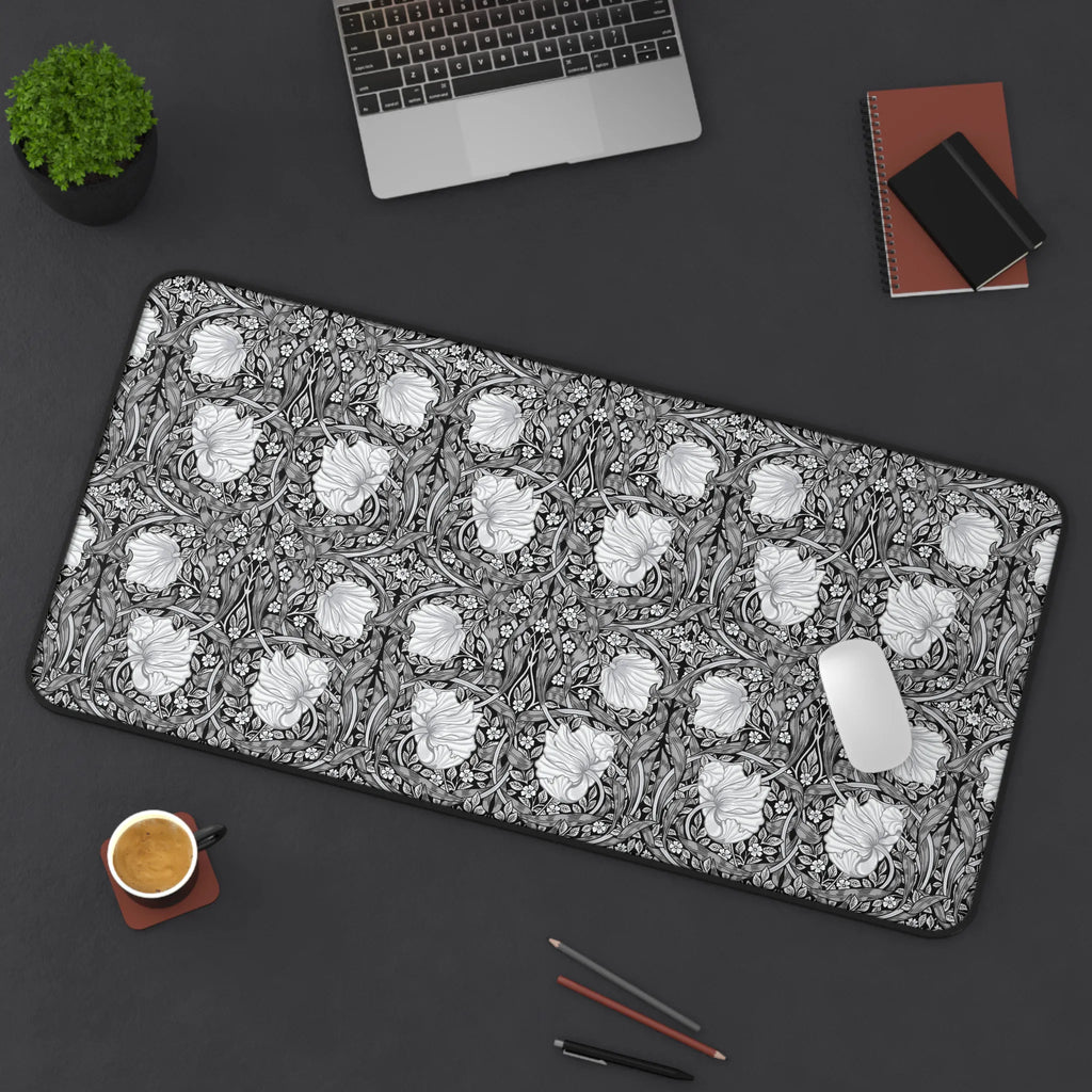 Pimpernel William Morris desk mat mouse pad on a dark surface with office items.