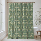 William Morris Pimpernel extra long shower curtain in Heritage Green 4483: creamy tulips and leafy greens on a heritage forest-green ground. Floor-length cotton sateen hung from a high-mounted rod in a bright bathroom, handmade to order in 84, 96 and 108 inch lengths.