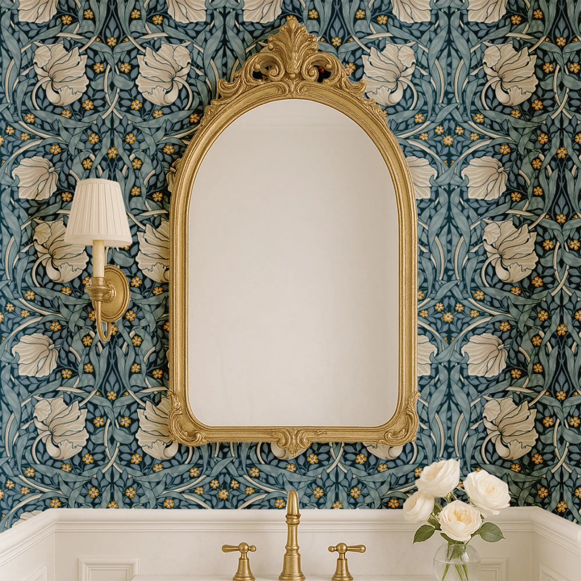 William Morris Pimpernel wallpaper shown in bathroom with ornate mirror and gold fixtures.