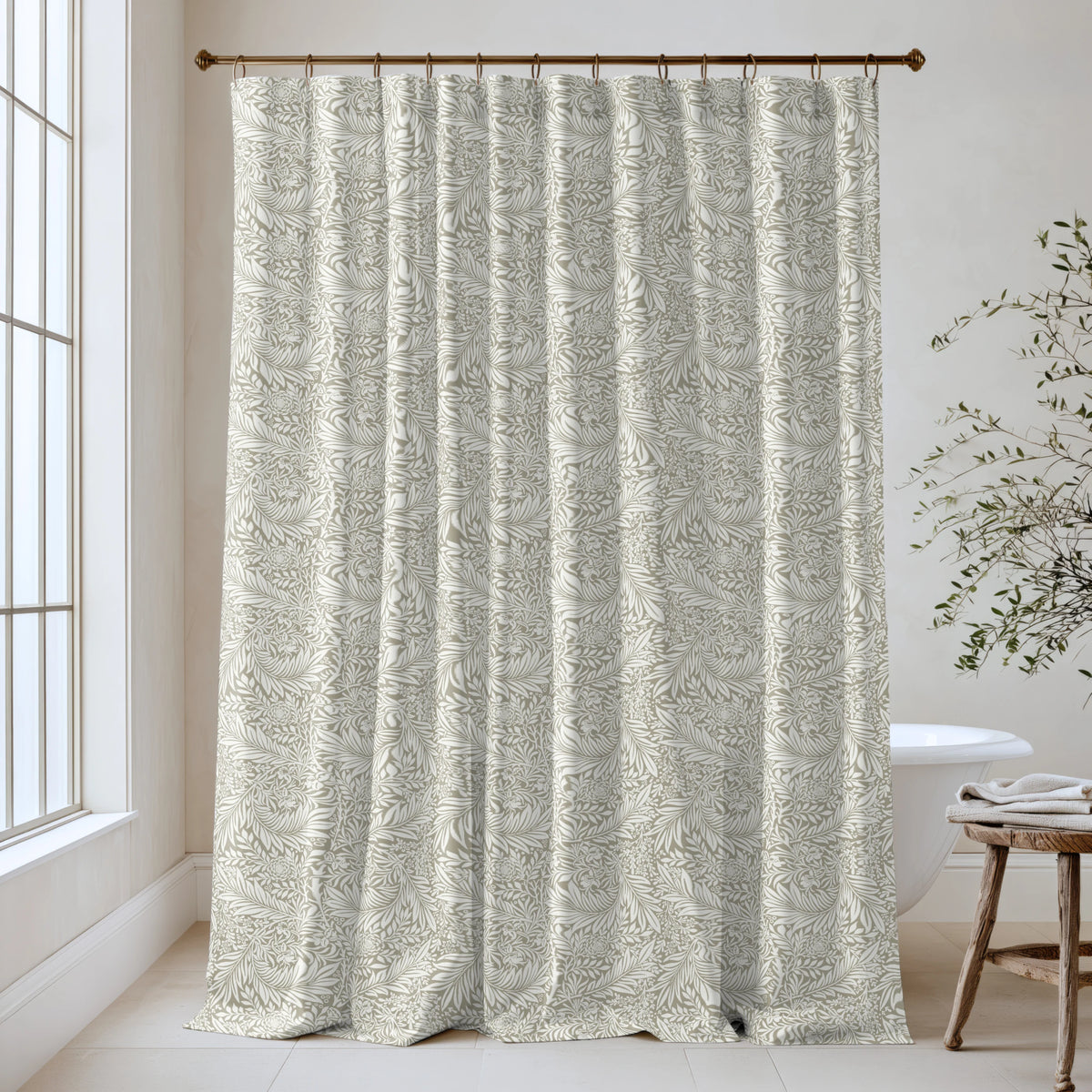 William Morris Larkspur extra long shower curtain in Olive Greige 4494: cool olive-khaki larkspur on a greige ground. Floor-length tone-on-tone cotton sateen hung from a high-mounted rod in a bright bathroom, handmade to order in 84, 96 and 108 inch lengths.