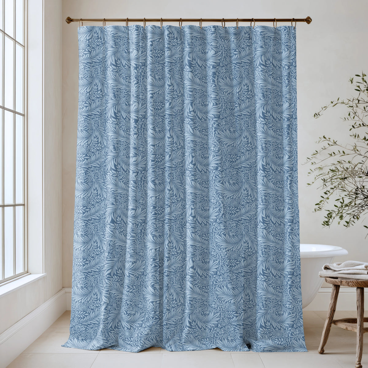 William Morris Larkspur extra long shower curtain in Cornflower Blue 4533: cornflower-blue larkspur on a lighter blue ground. Floor-length tone-on-tone cotton sateen hung from a high-mounted rod in a bright bathroom, handmade to order in 84, 96 and 108 inch lengths.