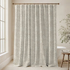 William Morris Larkspur extra long shower curtain in Warm Sand 4725: warm sand-beige larkspur on a creamy tan ground. Floor-length tone-on-tone cotton sateen hung from a high-mounted rod in a bright bathroom, handmade to order in 84, 96 and 108 inch lengths.