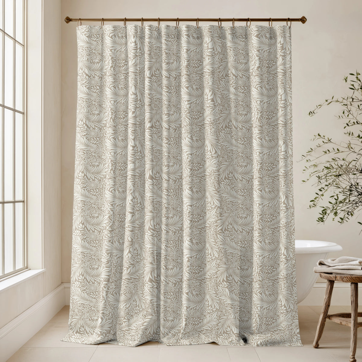 William Morris Larkspur extra long shower curtain in Warm Sand 4725: warm sand-beige larkspur on a creamy tan ground. Floor-length tone-on-tone cotton sateen hung from a high-mounted rod in a bright bathroom, handmade to order in 84, 96 and 108 inch lengths.