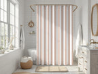 Neutral beige and white striped shower curtain styled in a bright bathroom interior, featuring a timeless farmhouse stripe pattern ideal for cottagecore and modern farmhouse decor.