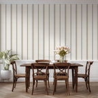 Neutral stripe wallpaper in linen and tobacco styled in a dining space, emphasizing cottagecore, farmhouse, and French country decor.