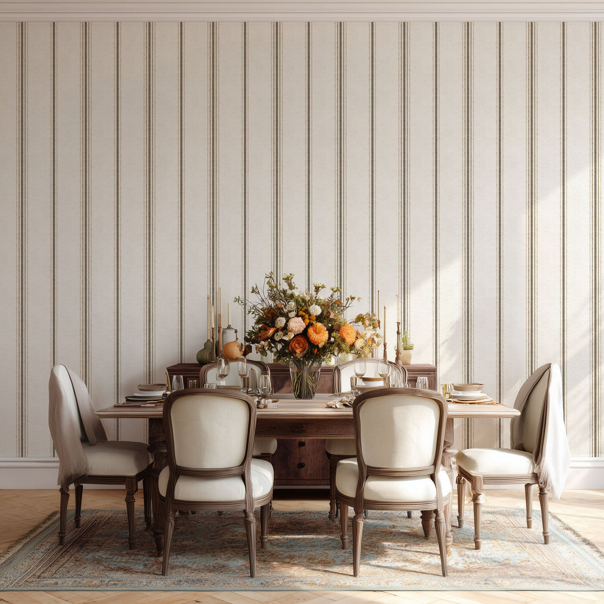 French country stripe wallpaper in Linen and Tobacco tones styled in a dining room, featuring a timeless vertical stripe pattern for neutral interiors.