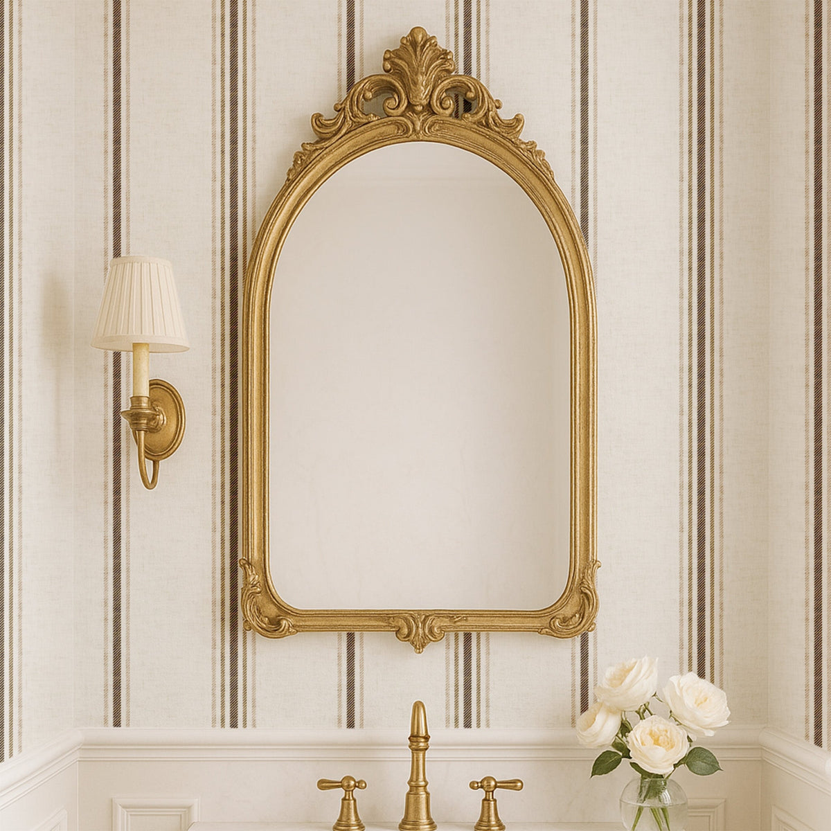 Linen and Tobacco stripe wallpaper styled behind an ornate mirror in a bathroom, showcasing elegant French country and heritage interior styling.