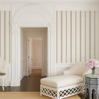 Linen and Tobacco stripe wallpaper styled in an elegant hallway with arched architecture, highlighting classic French country and timeless interior design.
