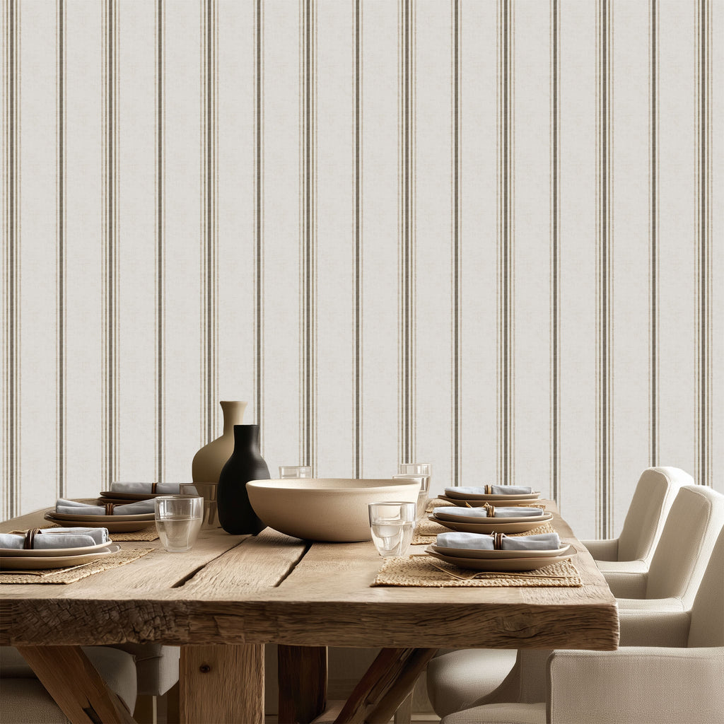 Linen and Tobacco stripe wallpaper styled in a dining room with wood table and neutral decor, showcasing French country and modern farmhouse interiors.