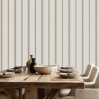 Linen and Tobacco stripe wallpaper styled in a dining room with wood table and neutral decor, showcasing French country and modern farmhouse interiors.