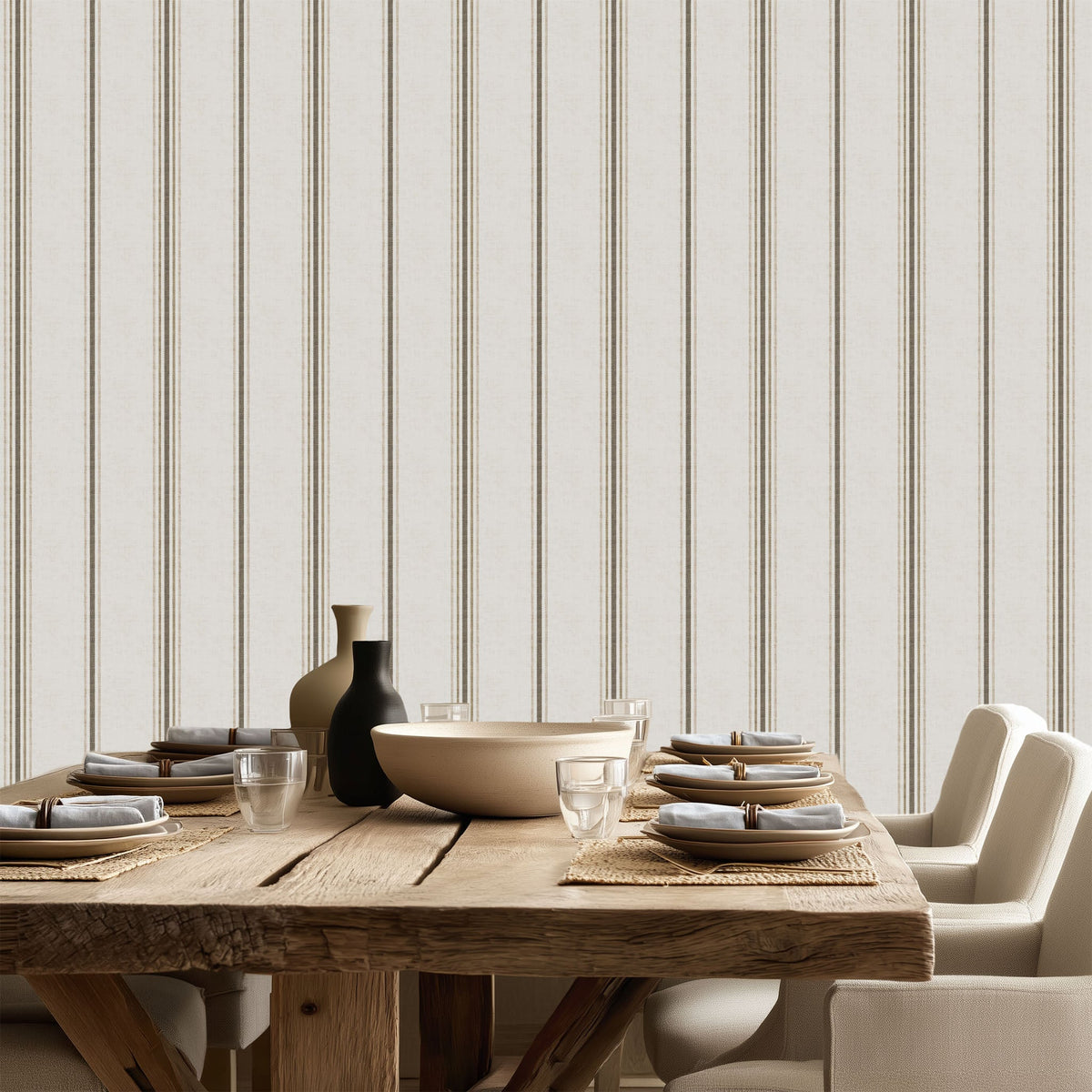 Linen and Tobacco stripe wallpaper styled in a dining room with wood table and neutral decor, showcasing French country and modern farmhouse interiors.