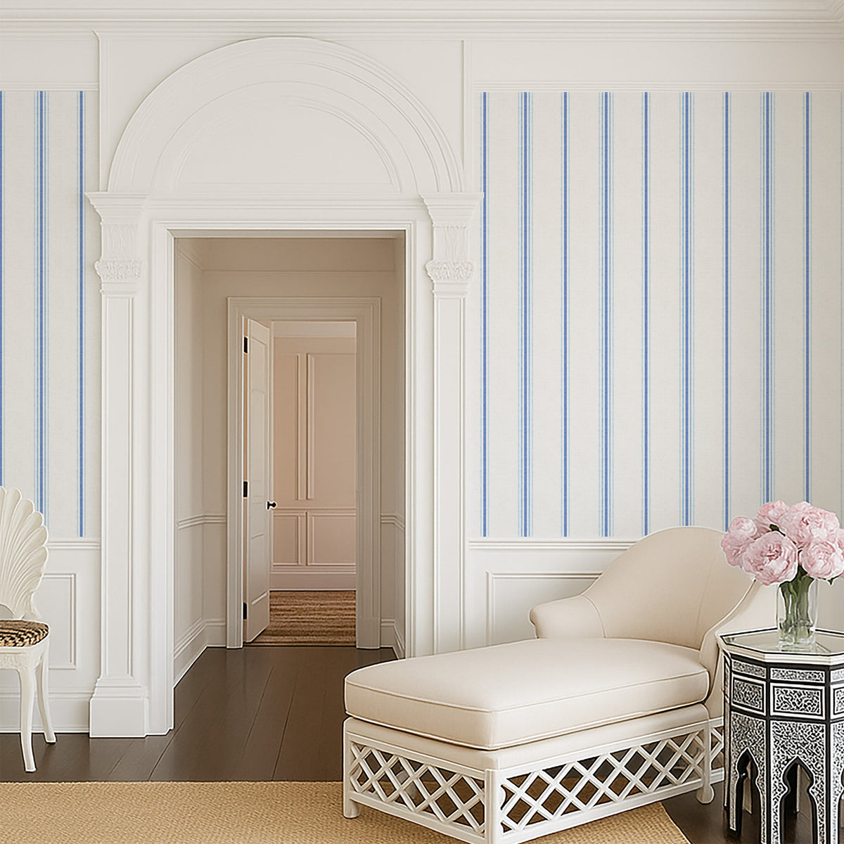 Chalk and French Blue stripe wallpaper styled in an elegant hallway with arched architecture, highlighting classic French country and timeless interior design.